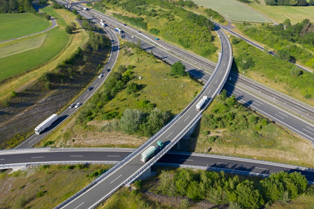 istock Highway Intersection with Traffic, Aerial View 1299327540