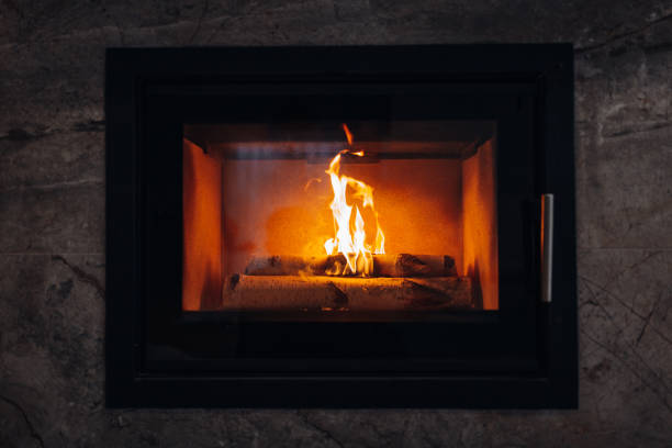 istock Fireplace burning wood logs, cozy warm home 1299327707