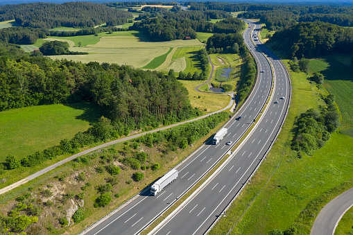 Highway with Trucks in Rural Area, Aerial View