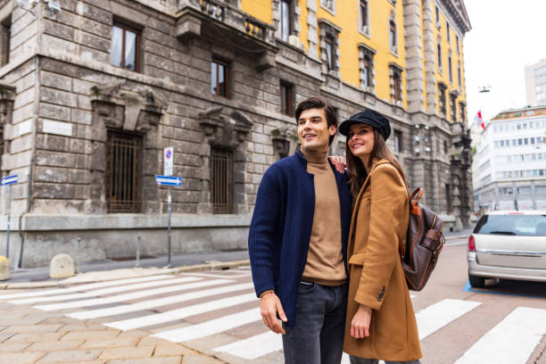 istock Young beautiful couple exploring a new city 1299331402