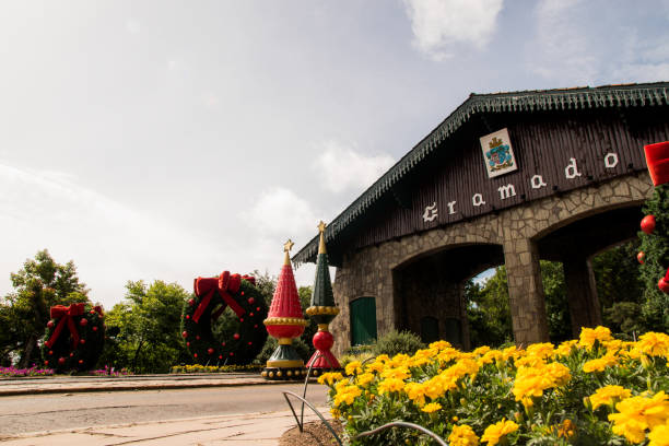 Porto Alegre, PR, Brazil - November 18, 2020: Portal of Gramado, Gramado/RS. Gramado is a city with a mountain resort located in the southernmost state of Brazil, Rio Grande do Sul. Influenced by 19th century German settlers, the city has a Bavarian flair with alpine chalets, chocolate shops and handicraft shops. Gramado is also known for its Christmas light displays and hydrangeas in bloom in spring.