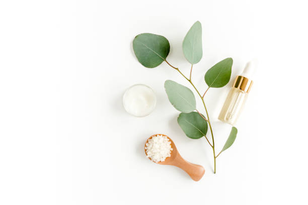 istock Eucalyptus essential oil, eucalyptus leaves on white background. Natural, Organic cosmetics products. Medicinal, Natural Serums. Flat lay, top view 1299335789