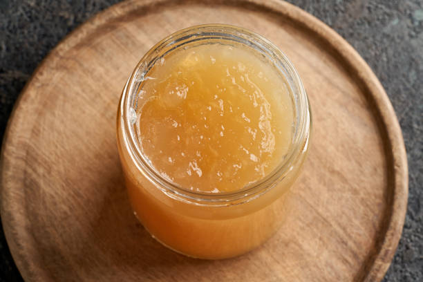 istock Cold congealed beef bone broth in a glass jar 1299335867