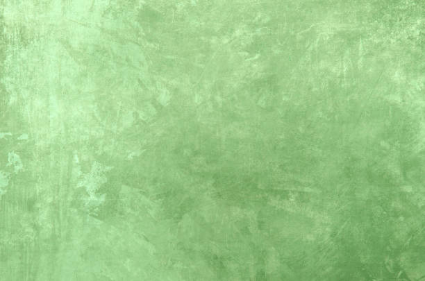 istock Pale green grungy background 1299336683