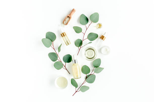 istock Eucalyptus essential oil, eucalyptus leaves on white background. Natural, Organic cosmetics products. Medicinal, Natural Serums. Flat lay, top view 1299338878