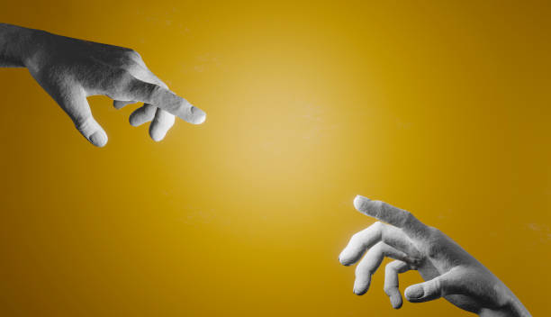 istock two cement hands trying to touch each other with their fingers 1299338918