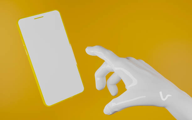 istock shiny white plastic hand pointing to a yellow mobile phone 1299339076