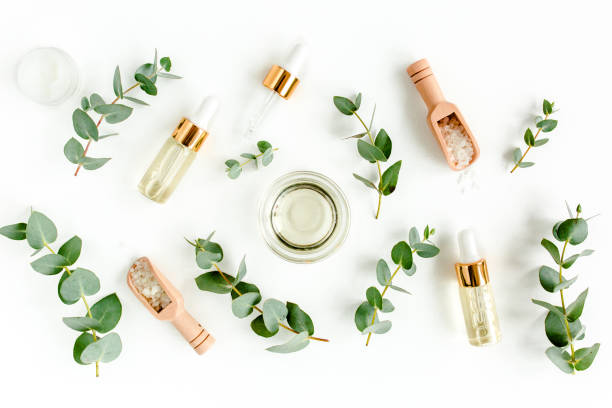 istock Eucalyptus essential oil, eucalyptus leaves on white background. Natural, Organic cosmetics products. Medicinal, Natural Serums. Flat lay, top view 1299341277