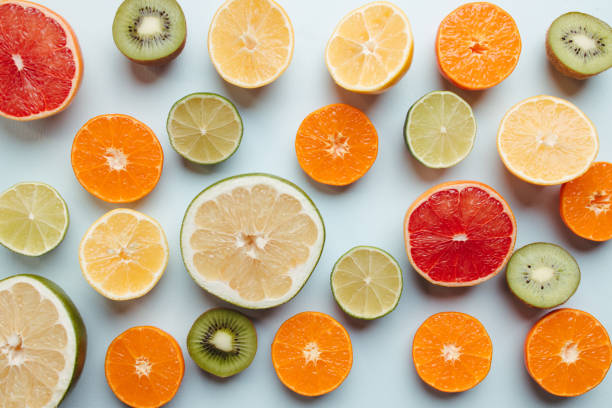 istock Summertime tropical background with exotic fruits 1299342657
