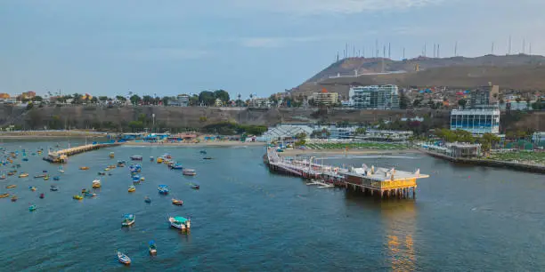 Photo of Aerial view sunset beach club in the district of Chorillos in Lima. Club Regatas.