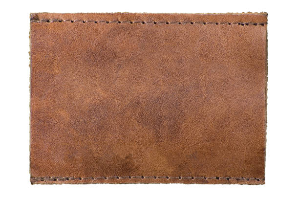 istock Jeans Tag, Grunge Blank Natural Grain Leather Texture Label Empty Isolated Brown Tan Macro Background Closeup, Large Detailed Horizontal Copy Space, Textured Pattern 1299346940