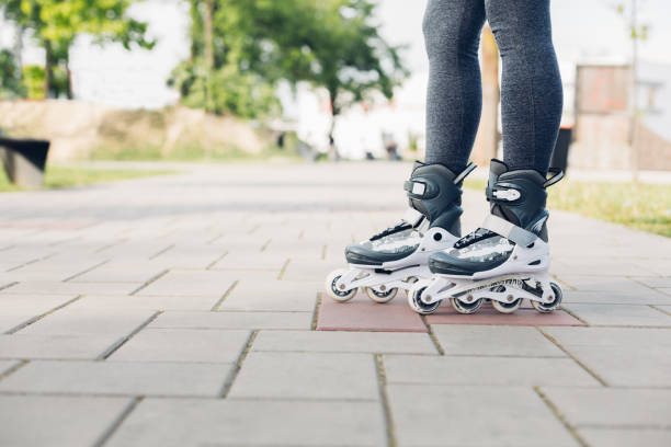 istock Girl On Roller Skates In The Park 1299348186