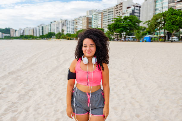 istock Confident chubby young woman exercise outdoors 1299348200