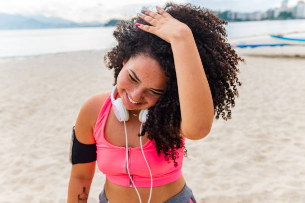 istock Confident chubby young woman exercise outdoors 1299348203