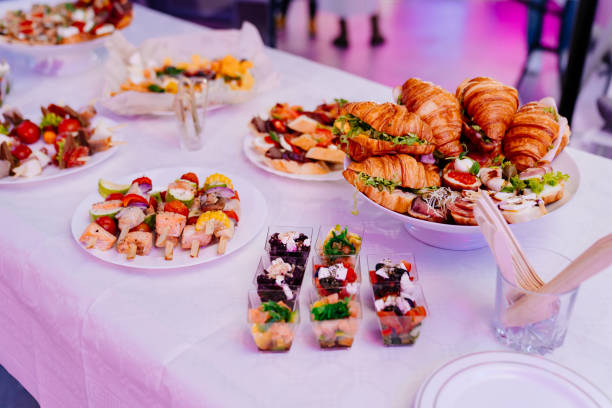 istock snacks in a white plate on the table for the banquet. 1299351466
