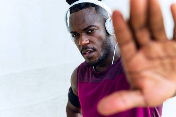 istock Confident muscular man in sportswear 1299351562