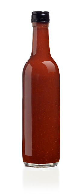 This is a front view photograph of a blank salsa bottle isolated on a white background