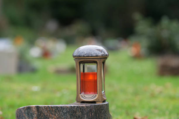 istock metal grave lantern on a marble pedestal 1299353077