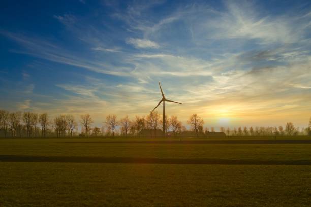istock Dutch landscape, wind turbine, horizon, colorful 1299353160