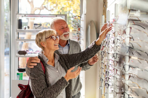 istock Senior couple shopping for eyeglasses 1299357674