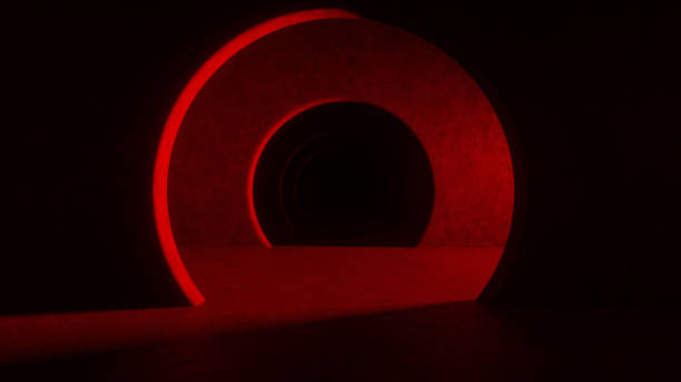 istock Abstract illuminated empty corridor interior made of gray concrete. Glowing red lines with shadow, neon light rays. Hallway arch tunnel corridor on dark background. 3d rendering 1299358941