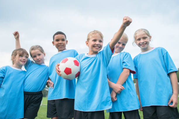 istock Yay we are the winning team 1299359760