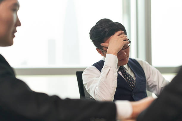 istock asian business people meeting in office 1299373083