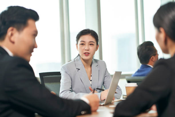 istock asian business people meeting in office 1299373127
