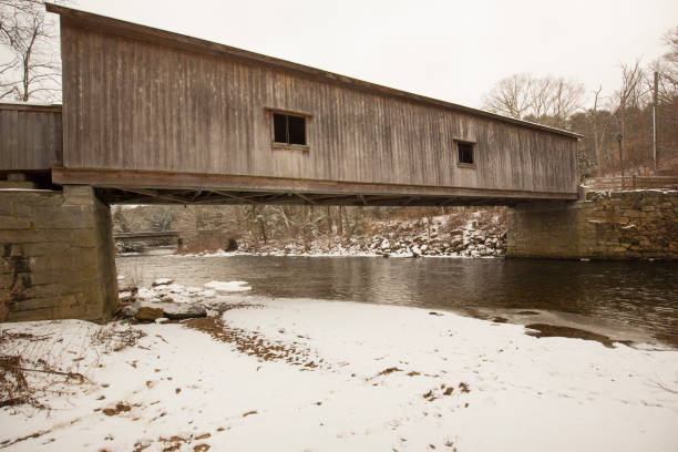 istock Comstock Covered Bridge over the Salmon River in Colchester, Connecticut. 1299386521