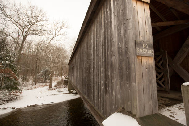 istock Comstock Covered Bridge over the Salmon River in Colchester, Connecticut. 1299387105