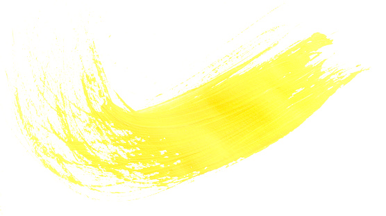 Yellow brush stroke isolated on white background