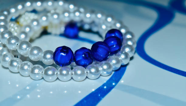 istock Blue and white plastic objects of necklace unique photo 1299389149
