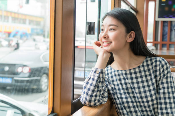 istock girl travel by bus 1299390103