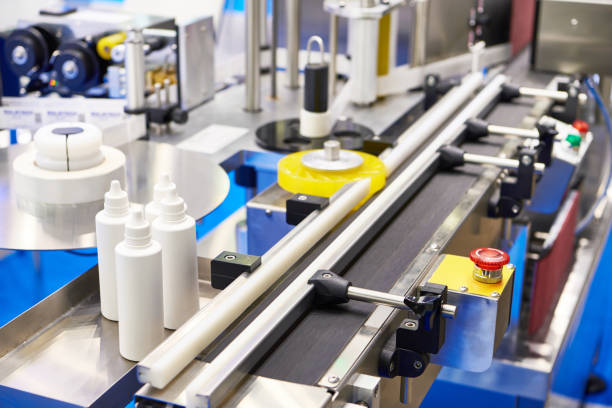 maszyny do etykietowania butelek z tworzyw sztucznych - industrial equipment automated business push button zdjęcia i obrazy z banku zdjęć
