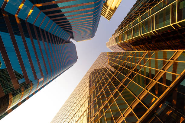 istock Low angle view of skyscrapers in city 1299407038