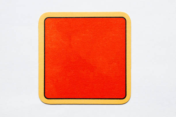 istock Old used coaster or bottle pad. For beer or other drinks, isolated. Add your own design, message or logo. 1299425592