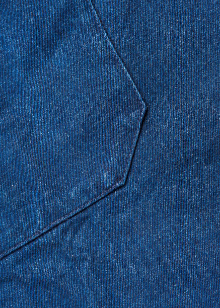 istock Dark blue jeans denim texture fabric background 1299425786