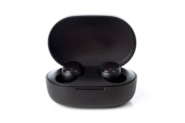 istock Bluetooth earbuds or earphones with box package isolated on white background. 1299425892