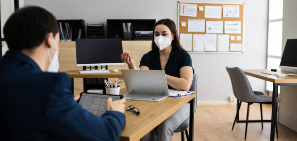 istock Business Job Interview Wearing Face Mask 1299431649