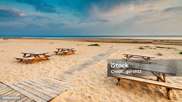 Wooden Footpath Leading To Sandy Beach Of The Baltic Sea In Jurmala Stock Photo - Download Image Now