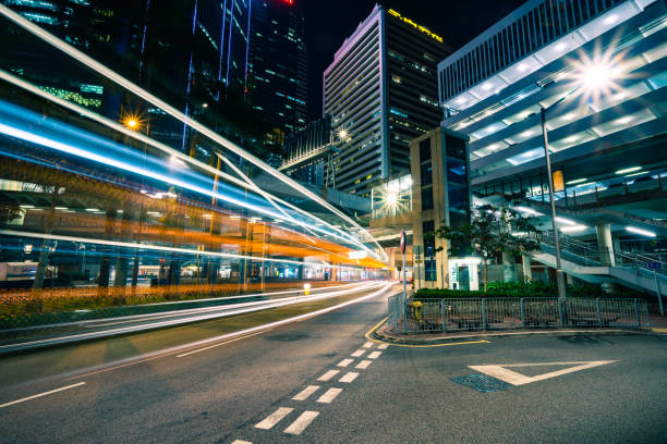 istock Traffic at bridge with sunset downtown in Hong Kong 1299433367