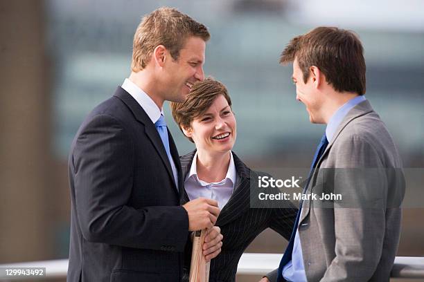 Business People Talking Outdoors Stock Photo - Download Image Now - 30-39 Years, 35-39 Years, Adult