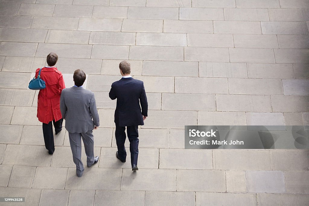Business people walking in courtyard  High Angle View Stock Photo