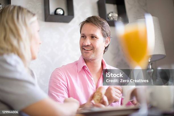 Couple Drinking Coffee At Breakfast Stock Photo - Download Image Now - 30-39 Years, 35-39 Years, 40-44 Years