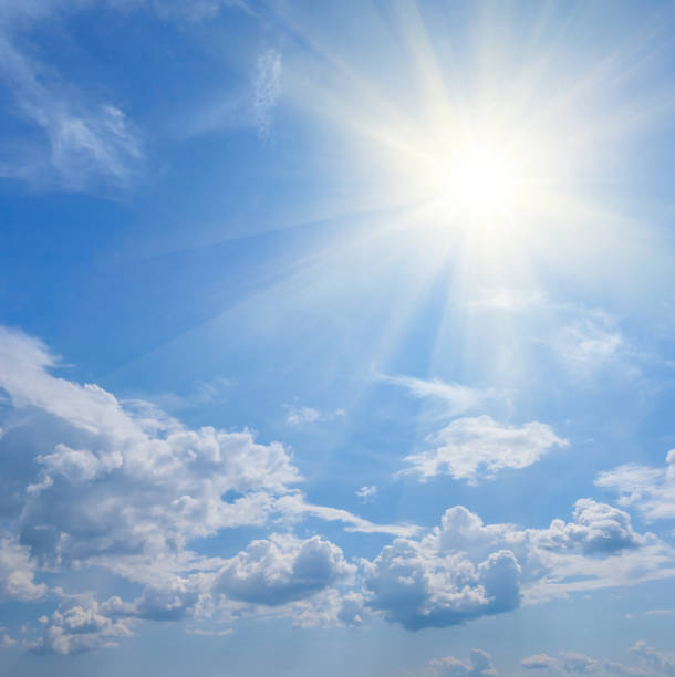 istock sparkle sun among dense cumulus clouds, natural summer sky background 1299440724