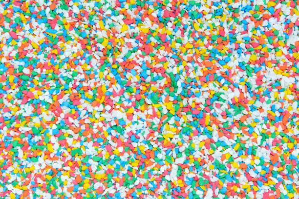 istock Close-up of small multi-colored stones background 1299441671
