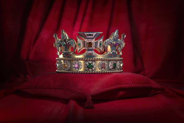 golden crown on red velvet background royal symbol, coronation. - majestade imagens e fotografias de stock
