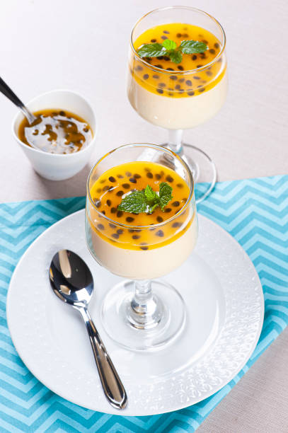 istock Passion fruit mousse. Refreshing dessert with fresh passion fruit topping 1299449571