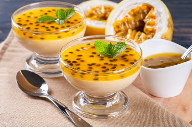 istock Passion fruit mousse. Refreshing dessert with fresh passion fruit topping 1299449574