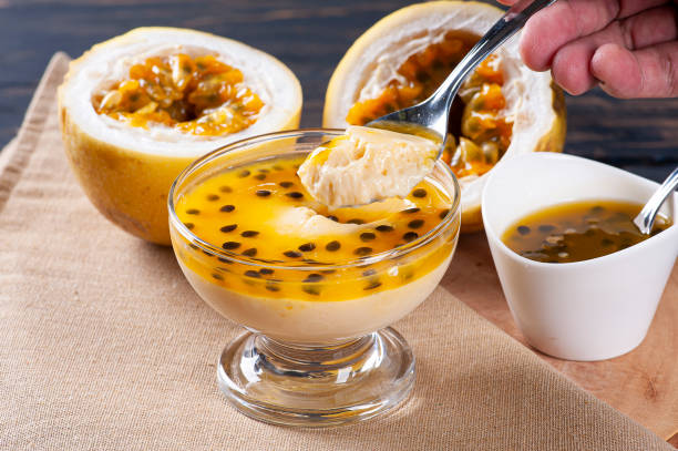 istock Passion fruit mousse. Refreshing dessert with fresh passion fruit topping 1299449581